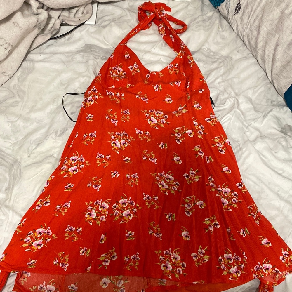 Red dress with small flowers .open in the back